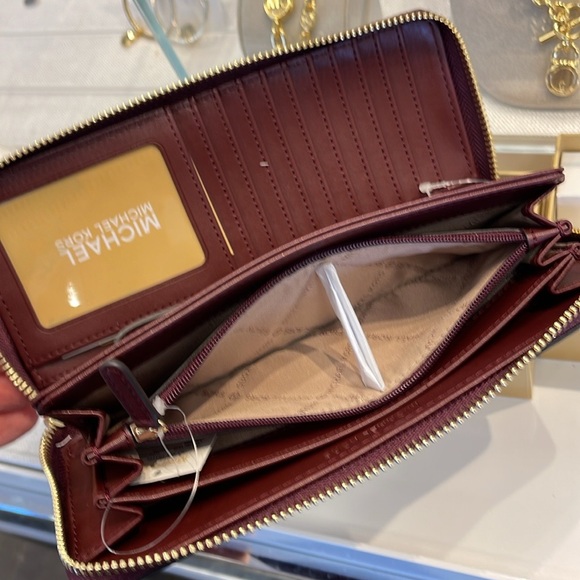 MICHAEL KORS
Leather Continental Wristlet Phone Case Wallet 
Oxblood 
NWT 
M - Picture 10 of 16